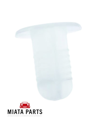 Genuine Mazda MX5 NA bumper side tab clip in white plastic from Miata Parts NZ